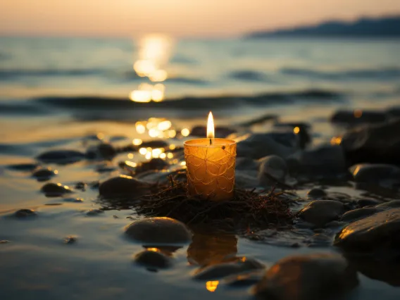 Remembrance Candle Burning Amidst Water