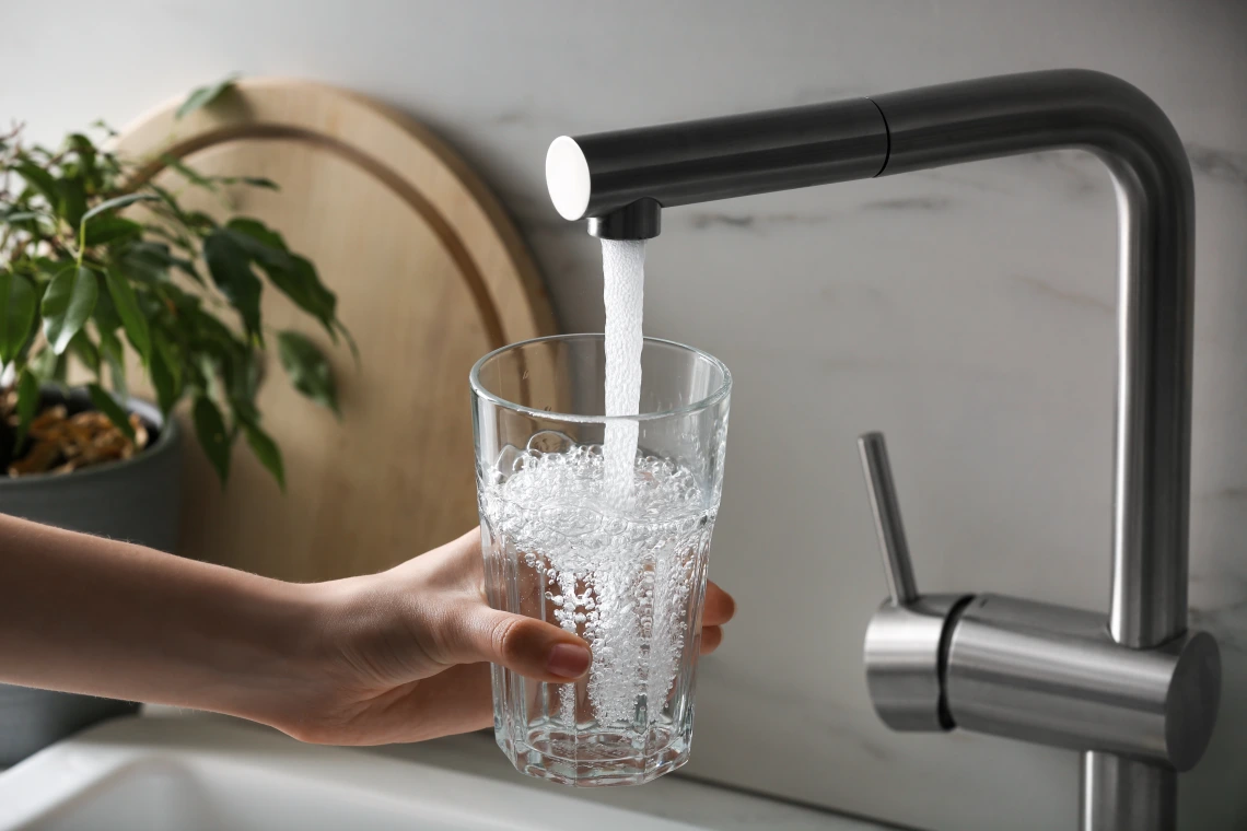 Filling Glass with Water from Kitchen Faucet
