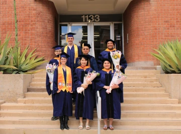 Xubin Zeng with his 2025 graduates
