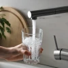 Filling Glass with Water from Kitchen Faucet